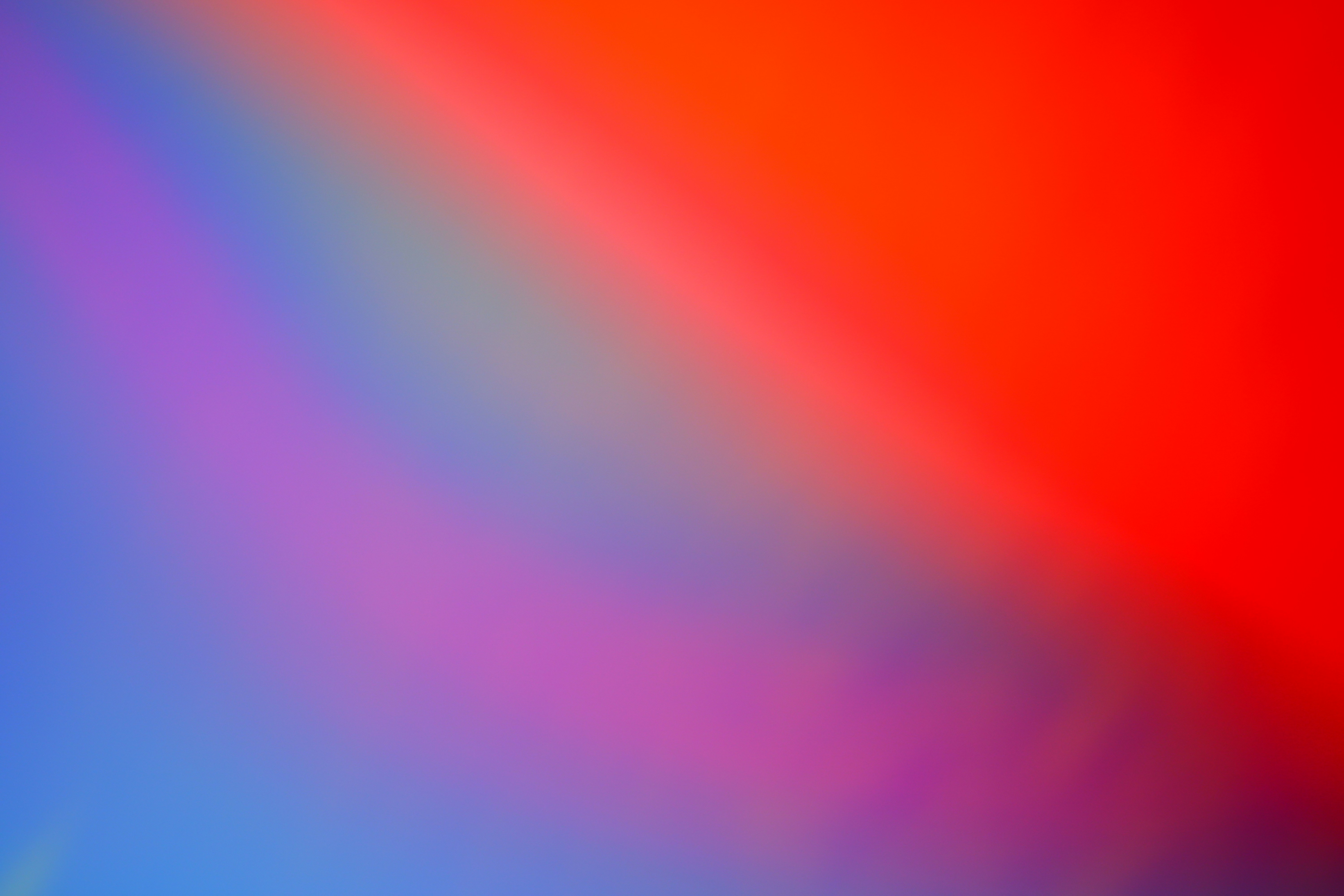Abstract blue, purple, orange, and red gradient
