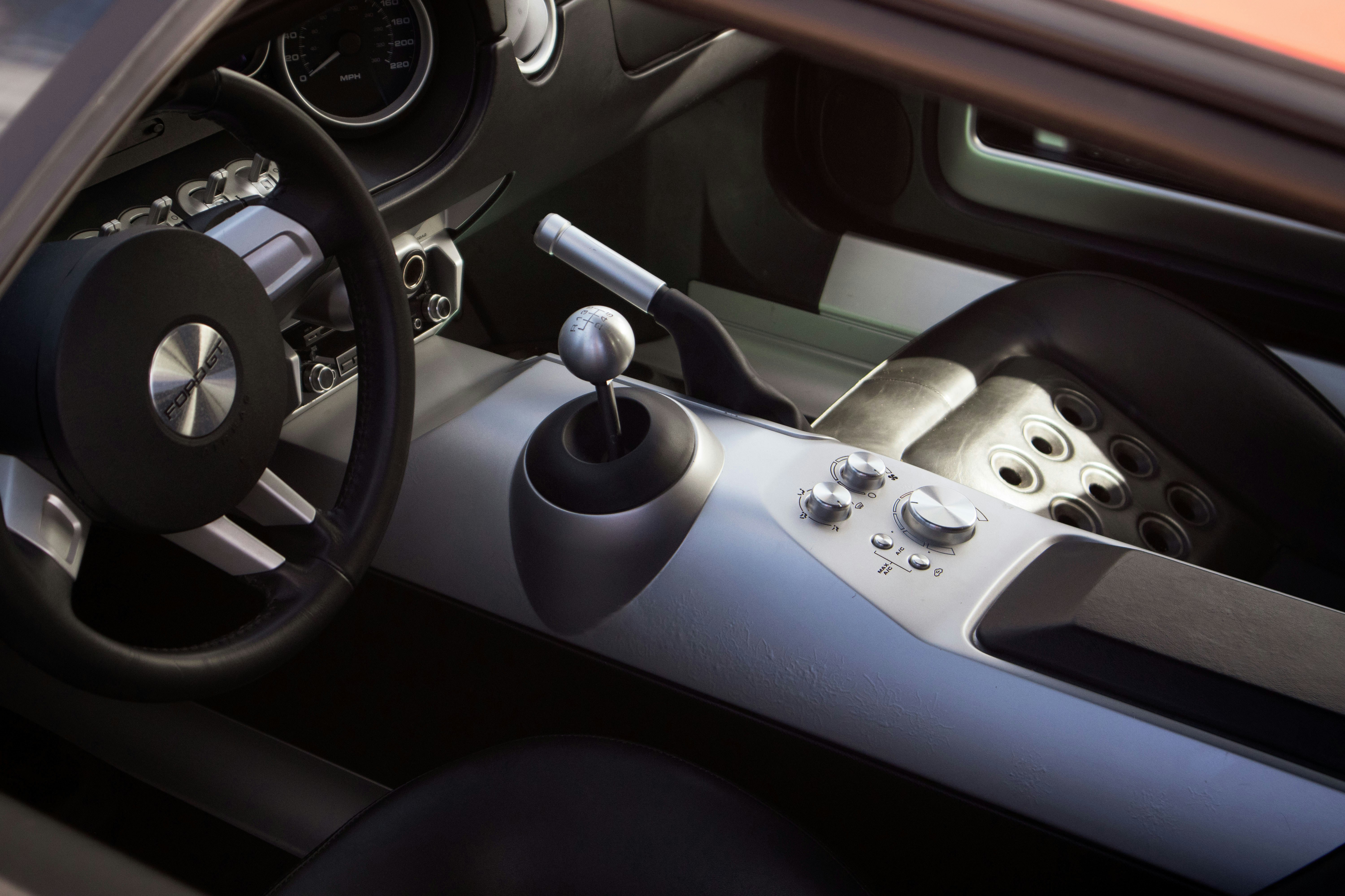 Sports car steering wheel and manual gear shift