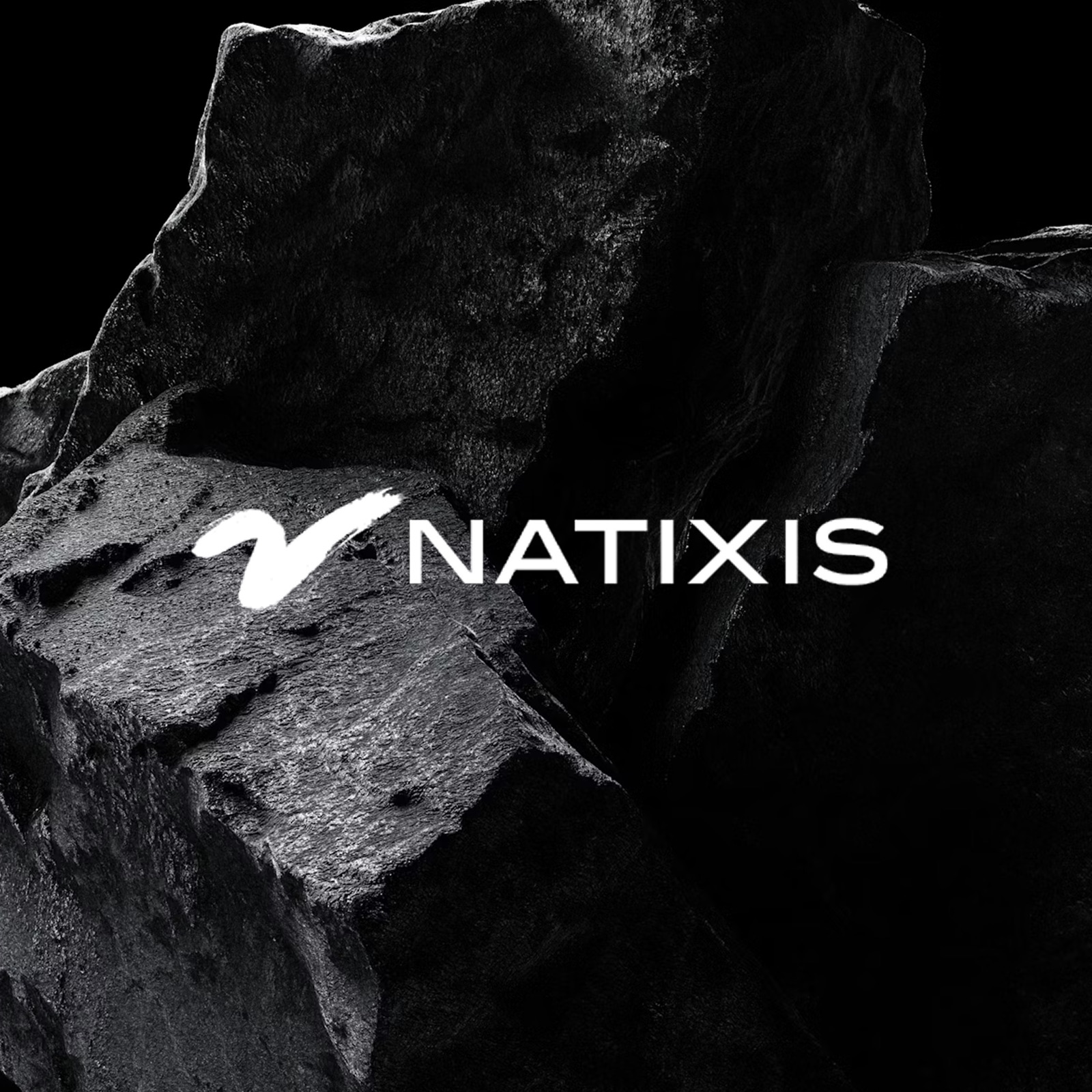 Natixis logo over black rock formations